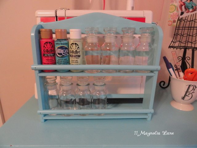 spice rack to organize acrylic paint bottles