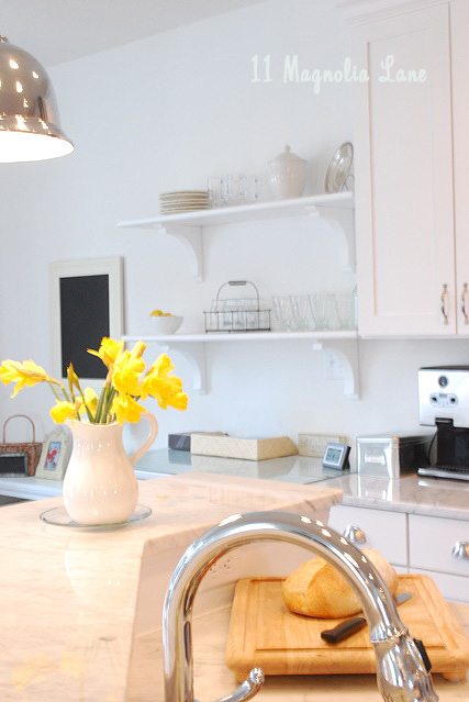 white kitchen with pops of yellow