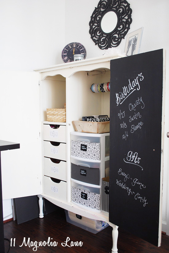 Armoire repurposed as organized gift wrapping station