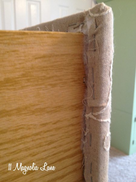 Staple fabric and batting to inside of drawer front