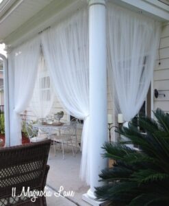 Sheer panels on covered porch
