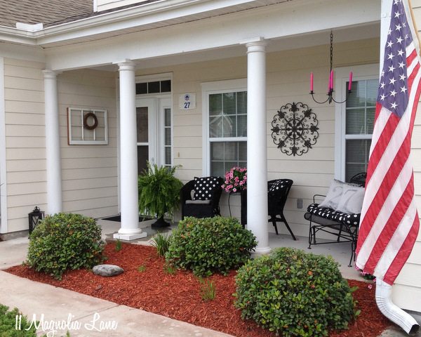 Front porch with black, white, and pink