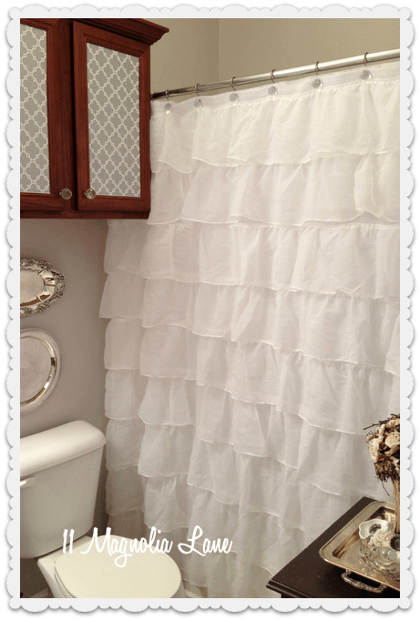 Ruffled shower curtain bathroom