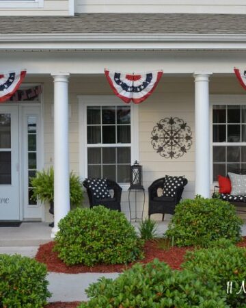 Fourth of July front porch with red, white, and blue bunting