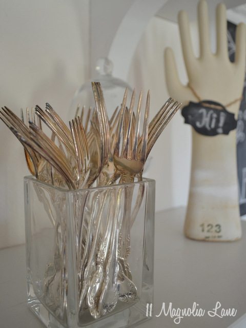 silver forks on display