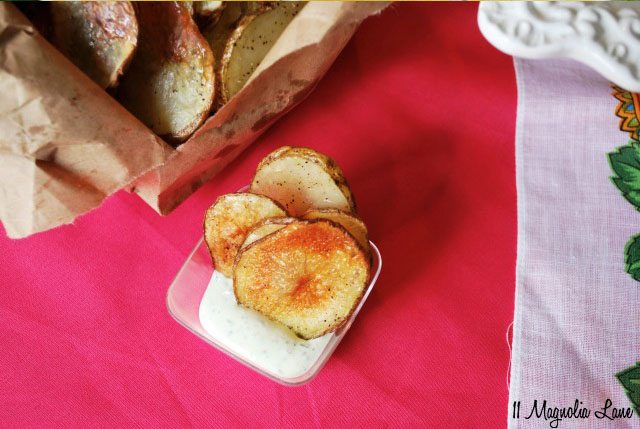 Homemade baked potato chips with herb dip