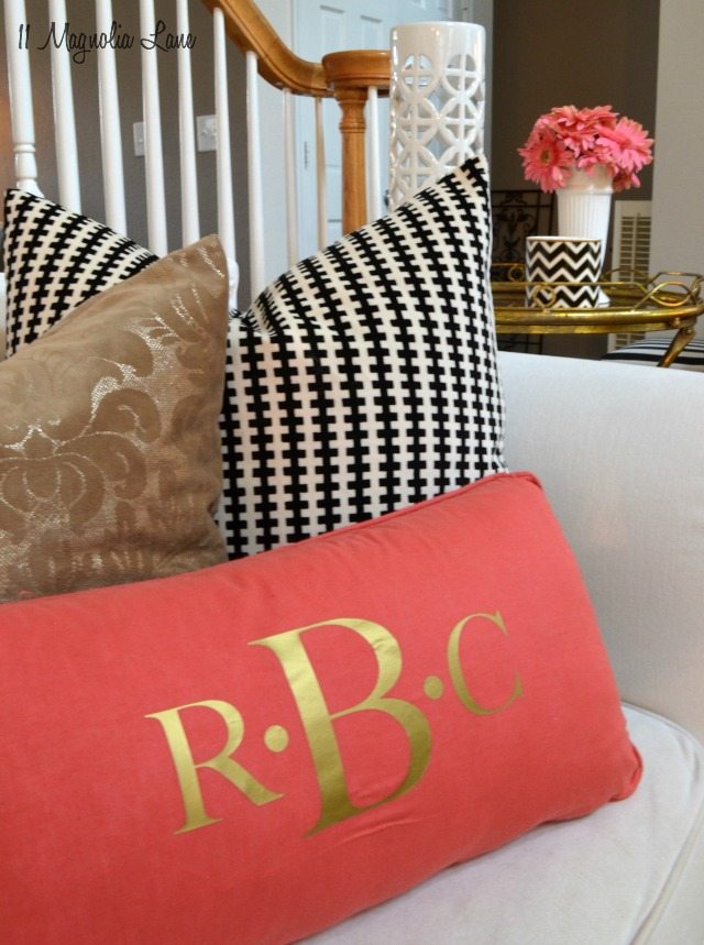 Living room in gold, pink, and black