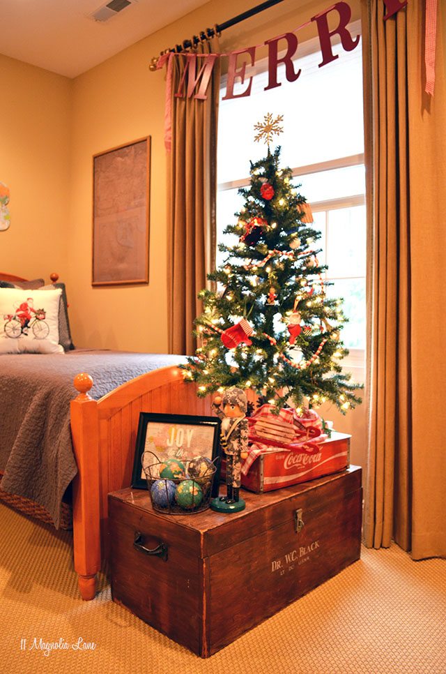 Teen boy room decorated for Christmas; woody; tree on car | 11 Magnolia Lane