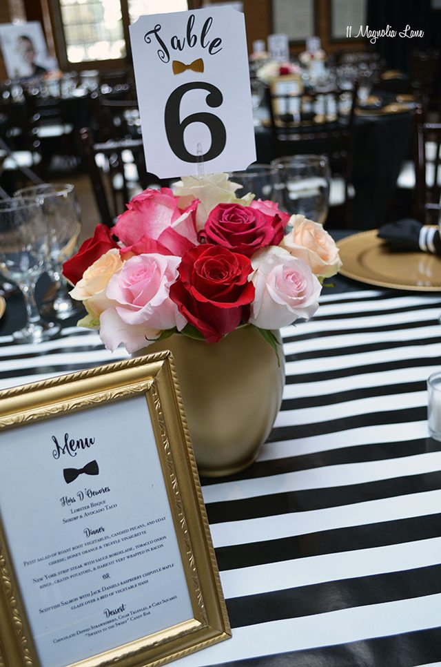 Formal event decor: black and white stripes with gold