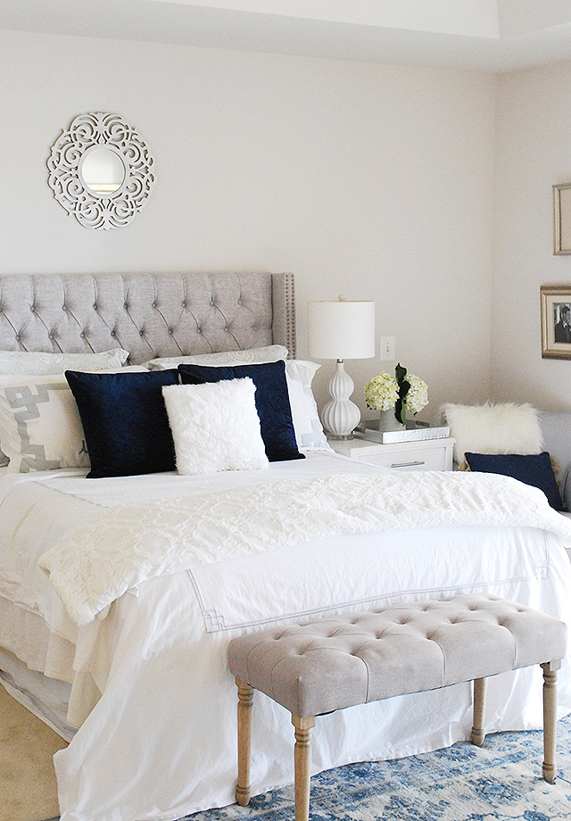 Winter master bedroom updates with affordable headboard options, blue and silver color scheme.