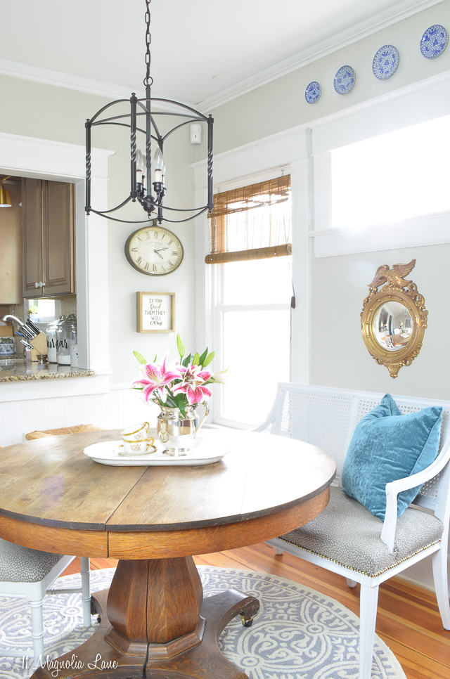 Vintage French cane bench used as dining banquette | 11 Magnolia Lane
