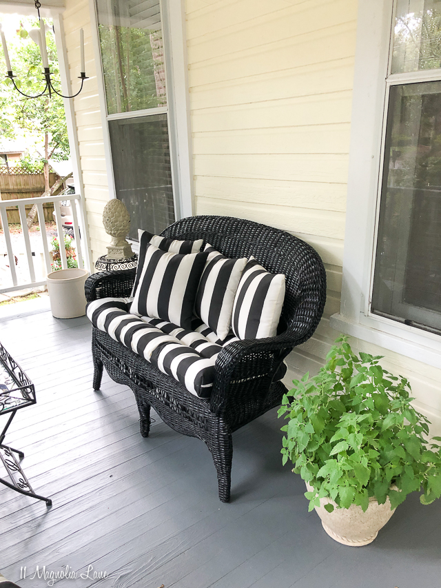 Magnolia Cottage front porch with black and white awning striped cushions | 11 Magnolia Lane