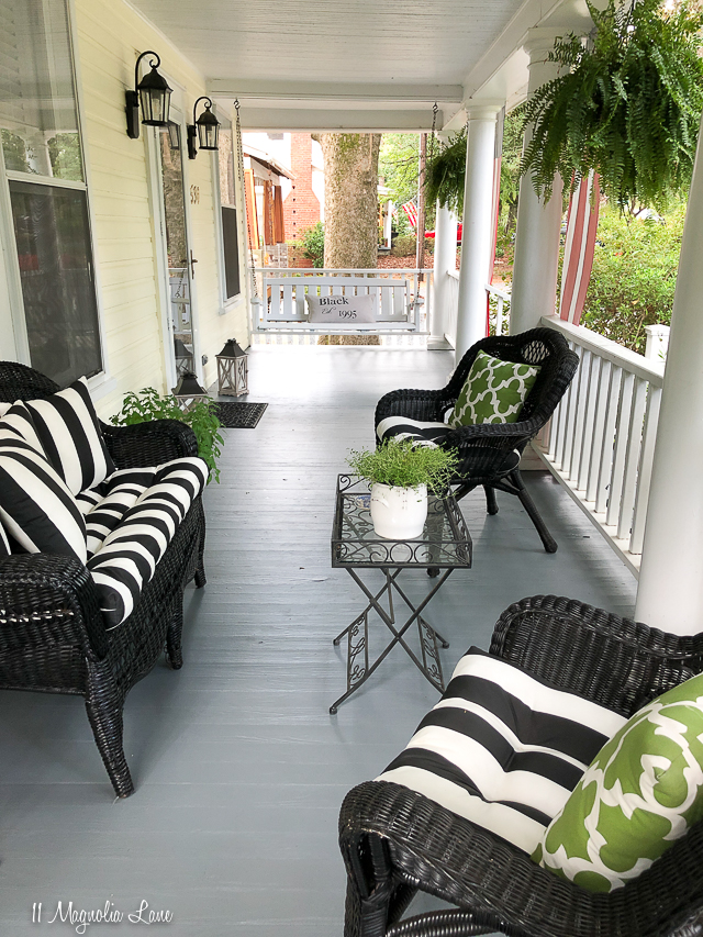 Magnolia Cottage front porch with black and white awning striped cushions | 11 Magnolia Lane