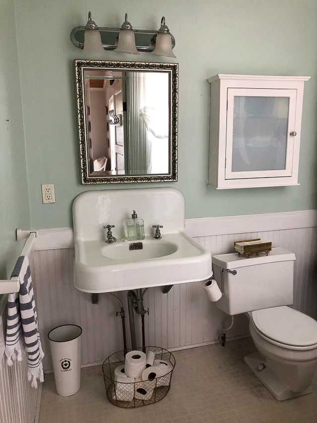 Magnolia Cottage: vintage bathroom with cast iron sink and tub