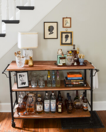 A masculine wood and metal bourbon themed bar cart | 11 Magnolia Lane